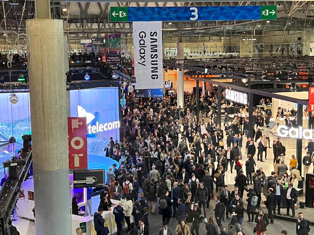 MWC trade show, people walking around the trade show booths